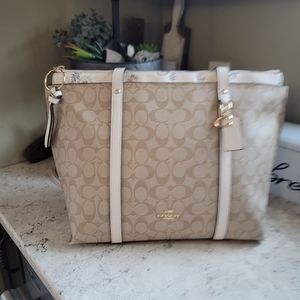 Coach may tote